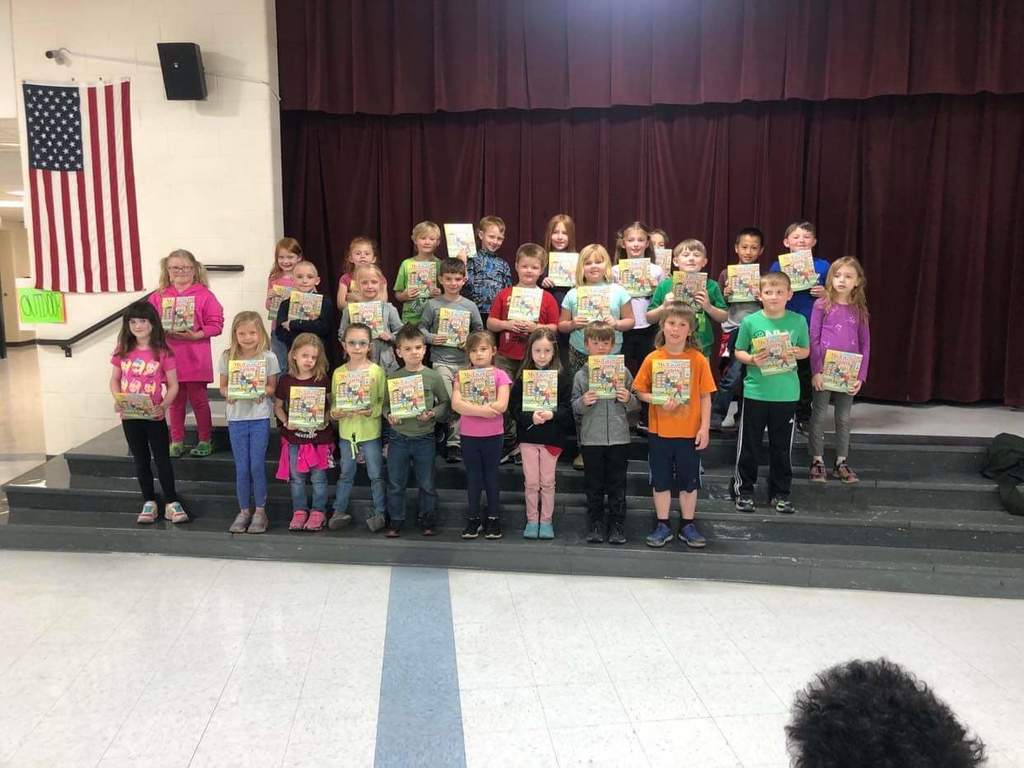 West students with new books